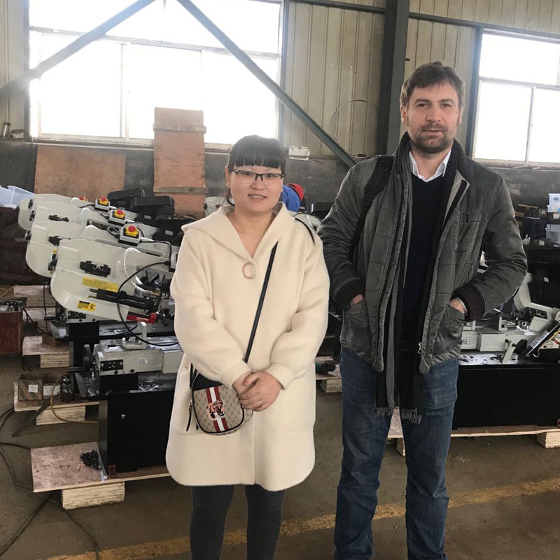 Belarus customer visit our factory and sign sawing machines